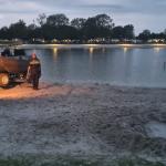 Police searching the recreational lake on campsite TerSpegelt in Eersel for a 14-year-old boy, 16 August 2023