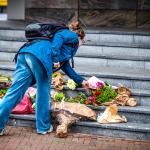 Flowers are laid on the steps of the Erasmus MC in memory of the three victims of the shooting in Rotterdam.