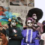 People dressed as Catrinas during the Day of the Dead boat parade in Amsterdam. October 2022.