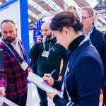 Aquatech Amsterdam visitors explore the booth at Chinese water systems firm Angel at RAI Amsterdam. November 2023