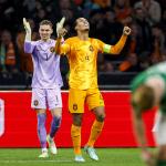 Holland goalkeeper Bart Verbruggen, Virgil van Dijk of Holland celebrate the victory during the European Championship match in group B between the Netherlands and Ireland in the Johan Cruijff ArenA on 18 november 2023 in Amsterdam, Netherlands. 