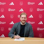 Marijn Beuker signs his contract as Director of Football at Ajax, 29 November 2023.