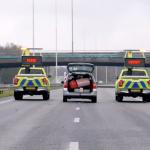 Scene from a Rijkswaterstaat promotional video with a "Merry Christmas" message after road workers help rescue Santa Claus during a breakdown. December 2023