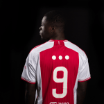 Football player Brian Brobbey in AFC Ajax jersey to stand against social hate