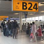 Passengers boarding a KLM flight at Schiphol Airport. 1 November 2023