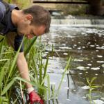 A RIVM worker testing water for medicine residues