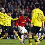 Emre Can of Borussia Dortmund, Malik Tillman of PSV Eindhoven during the UEFA Champions League last 16 match between PSV Eindhoven and Borussia Dortmund at Phillips Stadium on February 20, 2024 in Eindhoven, Netherlands.