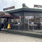 Customers walking into De Carrousel pancake restaurant in Amsterdam Centrum. 7 February 2024