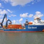 The cable layer Nexus (2014) owned by the Dutch maritime company Van Oord, which specializes in dredging including land reclamation, beach washing and the construction of artificial islands. Seen in the port of Rotterdam.