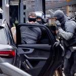 A man, probably the hostage-taker, is arrested by the DSI in front of a café in Ede. This put an end to a hostage situation in the cafe, in which four people were held