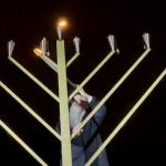 Rabbi Aryeh Heintz lights the Hanukkah menorah in Utrecht. 17 December 2023