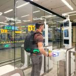 A man going through passport control at Schiphol Airport