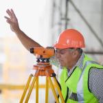 Older worker with leveling board