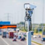 Surveillance camera in front of a Dutch highway with traffic