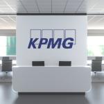 KPMG logo above reception desk in the modern office, editorial conceptual 3D rendering