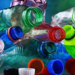 Empty colored carbonated drink bottles. Plastic waste 