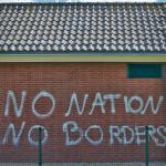 No Nation No Borders, graffiti on a utilitarian building in Lauwersoog, the Netherlands