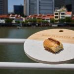 A Meatable lab-grown saussage in a bun at the company's first tasting in Singapore, 3 October 2023