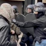 The moment a police officer charged into a pro-Palestinian demonstration in Amsterdam to grab one young man in a yellow hat, as the other officers used shields, batons and dogs to push the crowd back. 9 May 2024