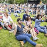 Attendees of a festival in Vondelpark in Amsterdam