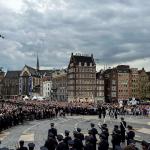 King Willem-Alexander and Queen Maxima are handed a wreath to place at the National Monument on Dam Square during the Remembrance Day ceremony in Amsterdam. 4 May 2024