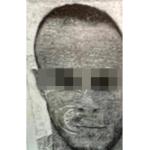 A passport photo of Mehrez Ayari, 38, suspected of shooting Vox politician Alejo Vidal-Quadras in November 2023