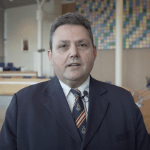 Still from a video in which Chris Jansen appears.