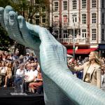 Kelly de Vries stands with the monument in Amsterdam dedicated to her murdered father, Peter R. de Vries. 15 July 2024