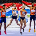 Femke Bol, Lieke Klaver, Eugene Omalla, Isaya Klein Ikkink celebrate their gold medal in the 4 x 400m mixed relay during the Olympic athletics competitions in Stade de France.