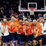 Jan Driessen, Dimeo van der Horst, Arvin Slagter and Worthy de Jong with the gold medals during the medal ceremony of the 3x3 basketball final between the Netherlands and France at the Place de la Concorde during the Olympic Games.