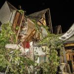 Debris are seen after the collapse of a hotel in Kroev, Germany, 7 August 2024