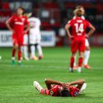 Anass Salah-Eddine of FC Twente is disappointed with the loss during the UEFA Champions League preliminary round match between FC Twente and FC Salzburg at Stadion De Grolsch Veste on August 13, 2024 in Enschede, Netherlands.