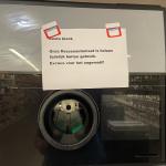 A note saying the can and bottle deposit machine at an Albert Heijn in Amsterdam is out of order. 30 June 2024