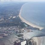 Aerial view of Wijk aan Zee, IJmuiden, and Forteiland in Noord-Holland on a sunny day. 11 August 2024