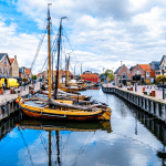 Traditional Wooden Fishing Boats, called Botters, moored in the harbor of the historic fishing village of Bunschoten-Spakenburg in the Netherlands