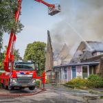 Firefighters fighting a fire at the Regenboogkerk in Epe, 20 August 2024