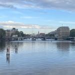 Looking north on the Amstel River in Amsterdam towards the Torontobrug, Amstel Hotel, with the Magerebrug and Zuiderkerk in the distance. 9 September 2024