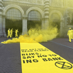 Extinction Rebellion activists protest in front of the Rijksmuseum in Amsterdam.