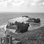 'Buffalo' amphibious vehicles taking troops of the Canadian First Army across the Scheldt, 1944.