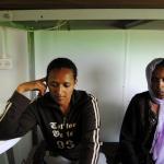 Two women at an asylum reception center