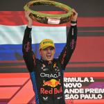 Red Bull Racing's Dutch driver Max Verstappen celebrates at the podium with the trophy of the Formula One Sao Paulo Grand Prix, at the Jose Carlos Pace racetrack, aka Interlagos, in Sao Paulo, Brazil, on November 3, 2024. 