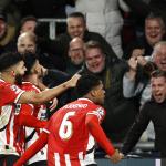 Ismael Saibari of PSV Eindhoven, Ricardo Pepi of PSV Eindhoven, Ryan Flamingo of PSV Eindhoven celebrate the 3-2 during the UEFA Champions League match between PSV Eindhoven and Shakhtar Donetsk at Phillips Stadium on November 27, 2024 in Eindhoven, Netherlands.
