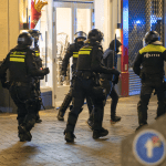 Riot police responding to attacks on Maccabi Tel Aviv football supporters in Amsterdam, 8 November 2024