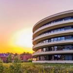 Modern apartments building during sunset in Apeldoorn city