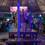 Young backpackers having fun in one of the bars in Vang Vieng, Laos