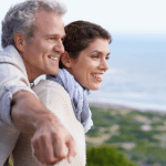 Mature couple, happy and outdoor on vacation