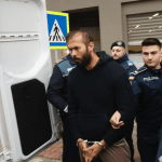 Bucharest, Romania - February 06, 2023: Andrew Tate and his brother leave the Directorate for Investigating Organized Crime and Terrorism where they were investigated for human trafficking and rape.