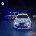 Image of car covered in Christmas lights on December 17, 2024.