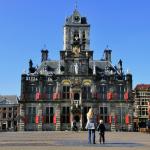Tourists on the Delft town hall square.