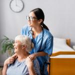 Caregiver with a woman at a nursing home